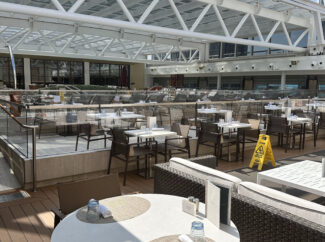 The pool area on the upper deck is adjacent to the Pool Grill. The whole area can be covered by a gigantic moveable roof.