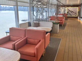 Sit by the huge windows to simply watch the world go by.