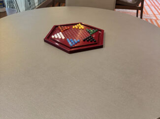 Games and activities abound, such as Scrabble, jigsaws, mahjong, cards and of course appopriately Chinese checkers.