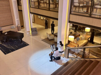 The spacious atrium, with regular entertainment, a bar and a sweeping staircase.